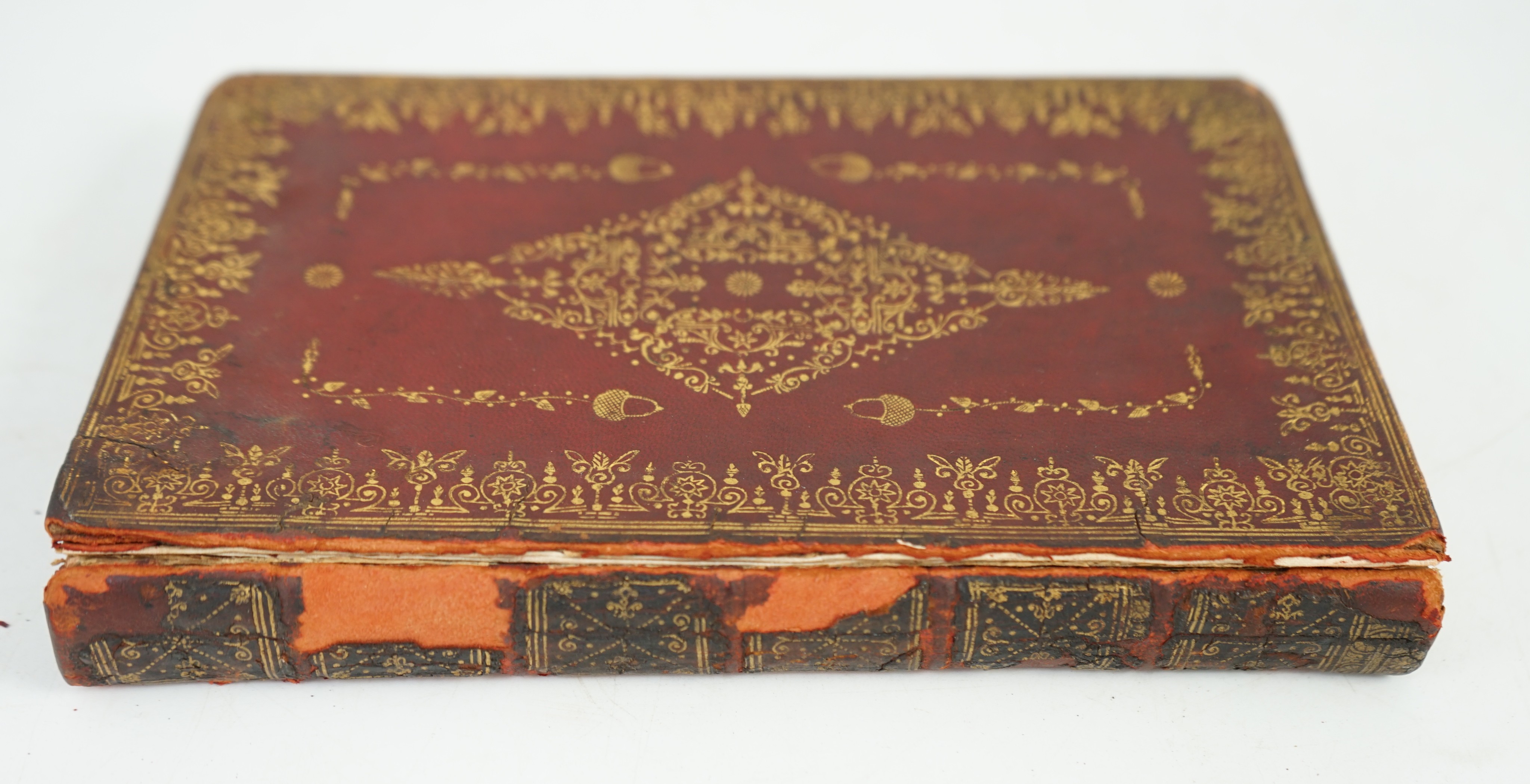 Book of Common Prayer and Administration of the Sacraments - Experimental edition, 8vo, red morocco, panel gilt embossed with lozenge devices and acorns, engraved title, portraits, volvelle to title verso, and vignette p